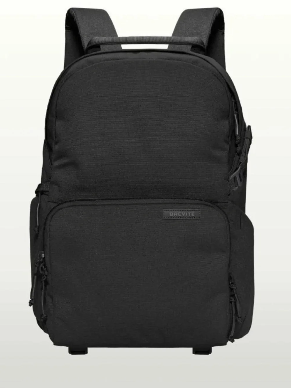 The Jumper Camera Backpack in Black with rain protection
